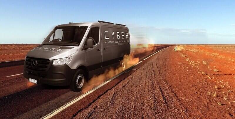 Cyber van on a dusty road in the middle of Australian outback.